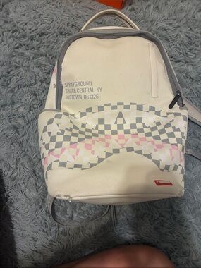 Sprayground White Checkerboard Wave Mini Backpack with Pink Accents